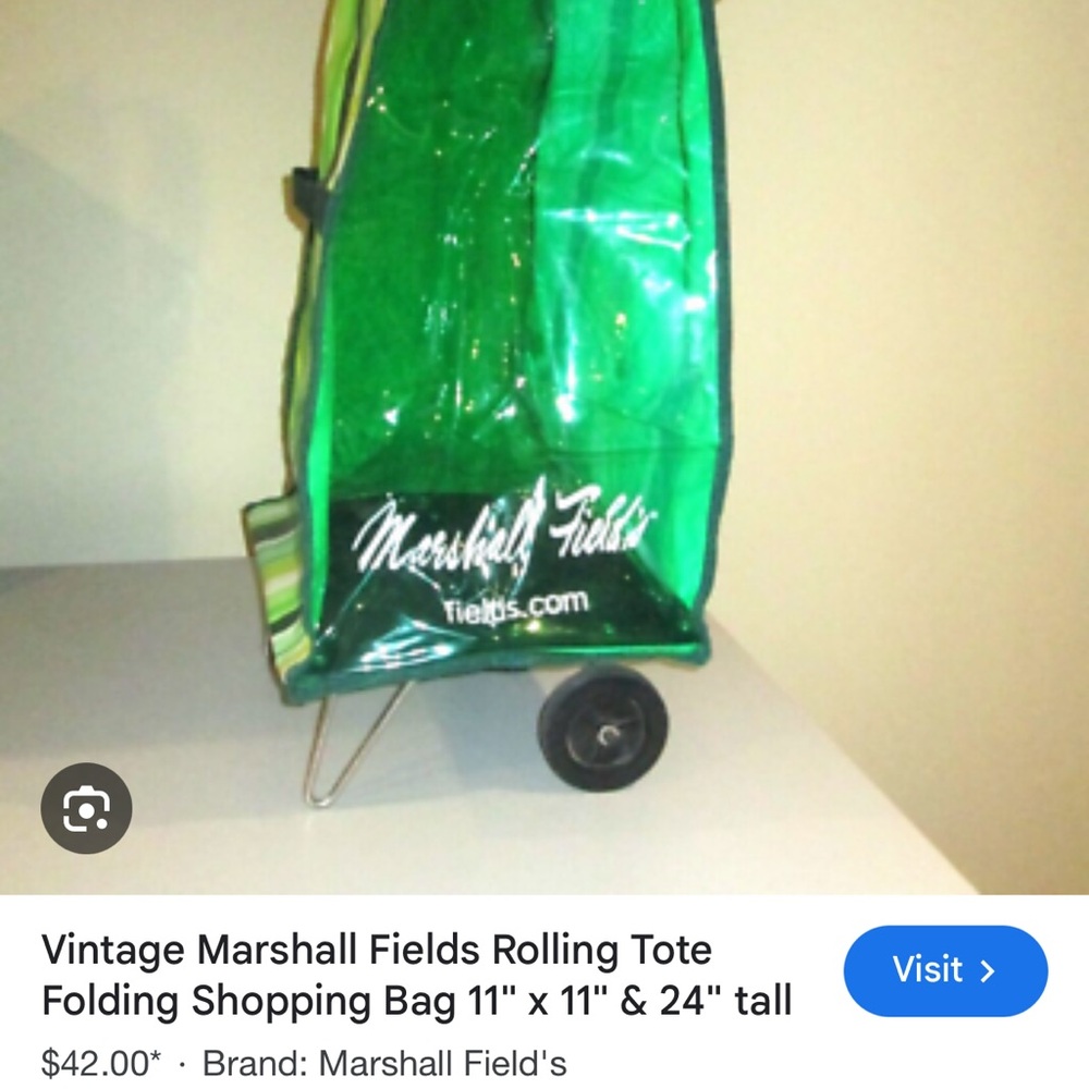 #Marshall Fields plastic rolling bag
